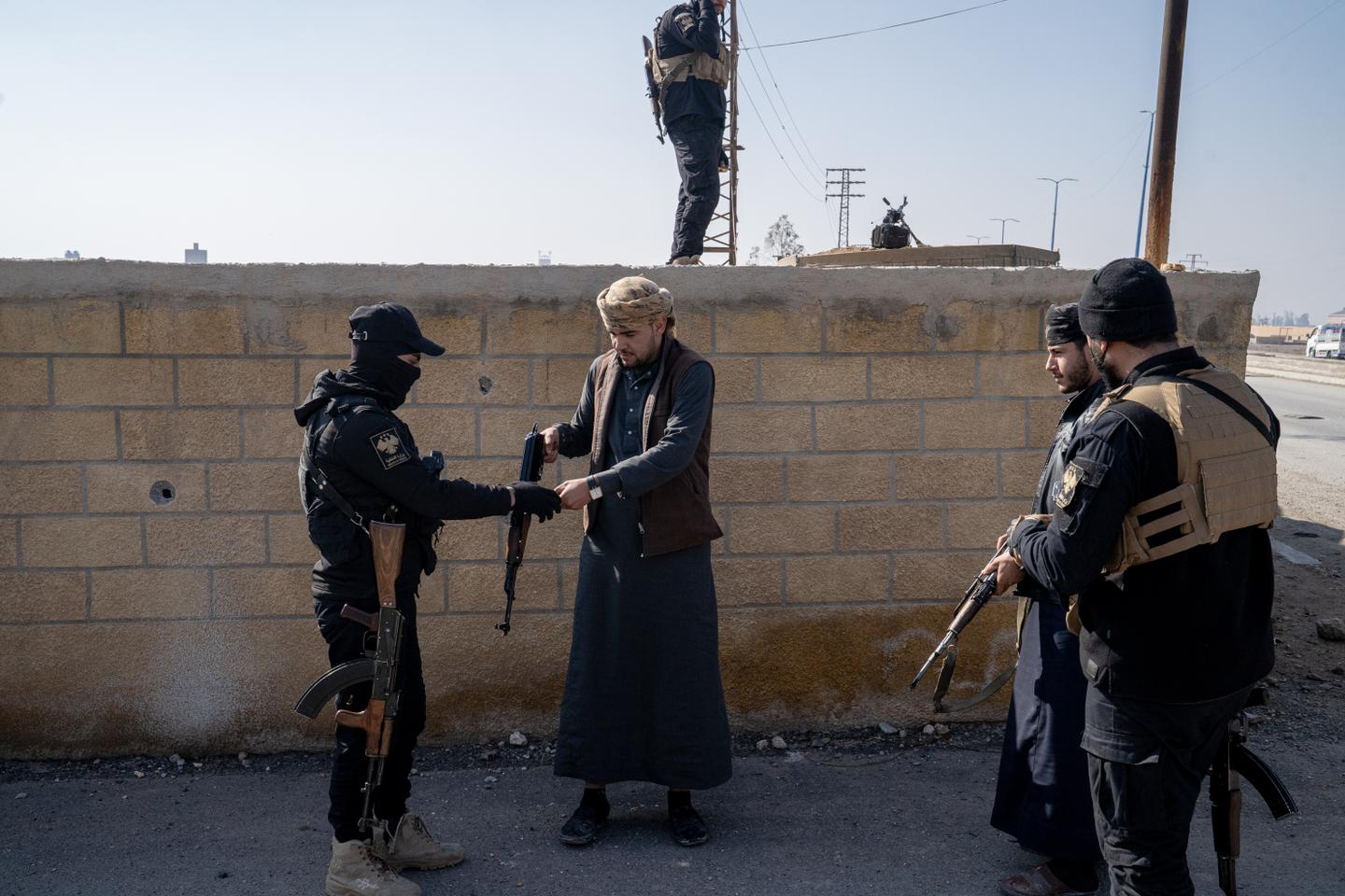 Former Kurdish-led fighters and Damascus test a fragile 'reconciliation' in northeastern Syria